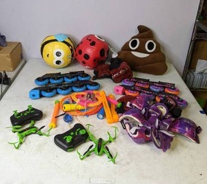 lot 407 image: Roller Derby Inline Kids Skate Blades, Remote Toy Planes, Pool Toys, POOP Emoji, and More - N