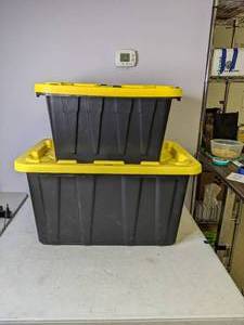 lot 409 image: Set of 2 HDX Tough Storage Totes in Black with Yellow Lid - N