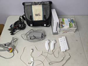 lot 348 image: Wii Gaming System with Games, Controllers, Cables, Carrying Case and More - N