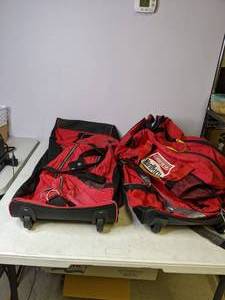 lot 464 image: Lot of (3) Red Duffel Bags Vintage Marlboro Adventure Team, Rolling Duffels - N