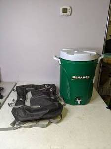 lot 468 image: Menards 5-Gallon Water Cooler and Outdoor Products Backpack - N
