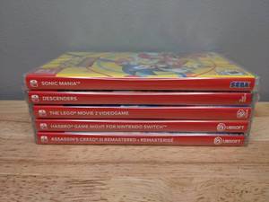 lot 16 image: Collection of 5 Brand New Nintendo Switch Video Games Sonic Assassins Creed Descenders Lego Hasbro Game Night - T