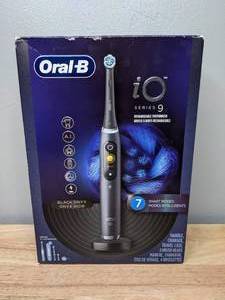 lot 6 image: Brand New Oral B iO Series 9 Electric Toothbrush with 4 Brush Heads Black Onyx