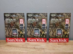 lot 48 image: Set of 3 Brand New SanDisk 32GB Mossy Oak Ultra Plus SD Cards