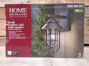 lot 45 image: Home Decorators Collection Wisteria Collection 1-Light Sand Black Outdoor Wall Lantern Sconce with Clear Glass Shade