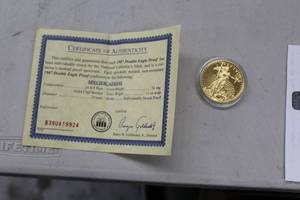 lot 854 image: 1907 Double Eagle Proof 31mg 24K Gold Clad Bronze Collectors Coin, Certificate of Authenticity (in case)