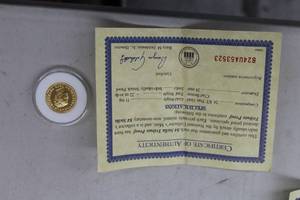 lot 855 image: 1879 $4 Stella Tribute Proof 11mg 24K Gold Clad Bronze Collectors Coin, Certificate of Authenticity (in case)