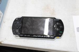 lot 869 image: Sony PSP Video Game System