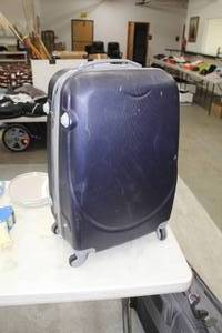 lot 1000 image: Wheeled Suitcase