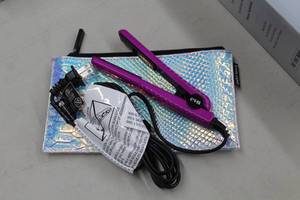 lot 951 image: Eva Hair Flat Iron, Carry Bag