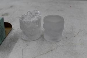 lot 984 image: Lot of (2) Skull Candleholders