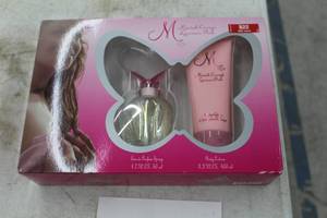 lot 973 image: Mariah Careys Luscious Pink Womens Perfume and Lotion Set (in original packaging)