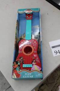lot 942 image: Disney Elena of Avalor Childrens Guitar (in original packaging)
