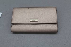 lot 1037 image: Kate Spade Womens Clutch