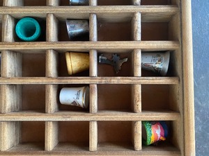 lot 70 image: Collection of Thimbles with Display Case