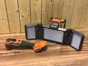 lot 63 image: RIDGID 18V Hybrid Folding Panel Light (Tool Only) Customer Returns See Pictures