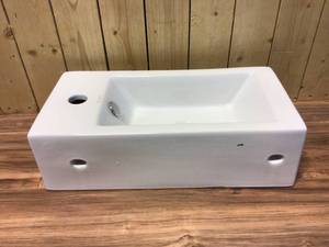 lot 7 image: Wall-Mounted Left-Facing Rectangle Bathroom Sink in White Customer Returns See Pictures
