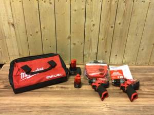 lot 19 image: Milwaukee M12 FUEL 12-Volt Lithium-Ion Brushless Cordless Hammer Drill and Impact Driver Combo Kit w 2 Batteries and Bag customer returns see pictures