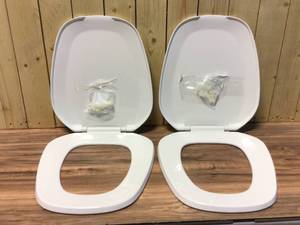 lot 22 image: Lot of 2 CENTOCO Eljer Emblem Round Closed Square Front Toilet Seat in White Customer Returns See Pictures