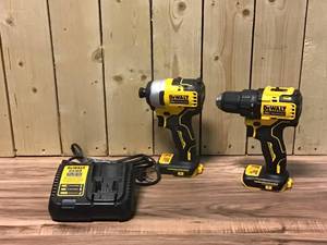 lot 24 image: DEWALT ATOMIC 20-Volt MAX Cordless Brushless Compact DrillImpact Combo Kit (2-Tool) with Charger & Bag No Batteries included Customer Returns See Pictures