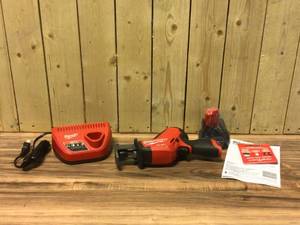 lot 27 image: Milwaukee M12 FUEL 12-Volt Lithium-Ion Brushless Cordless HACKZALL Reciprocating Saw with battery and charger  Customer Returns See Pictures