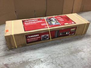 lot 106 image: Ready-to-Assemble 24-Gauge Steel Freestanding Garage Cabinet in Black (36 in. W x 72 in. H x 18 in. D) by Husky Customer Returns See Pictures