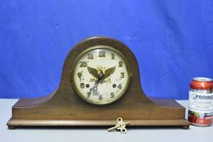 lot 6 image: Antique eagle mantle clock