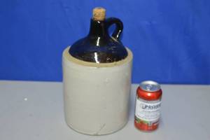 lot 12 image: Vintage Tan and Brown Stonewear Jug
