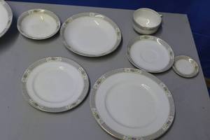 lot 16 image: Knowles, Tayler & Knowles fine china - multiple place settings and serving dishes
