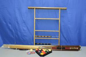 lot 22 image: Pool cues and ball set up
