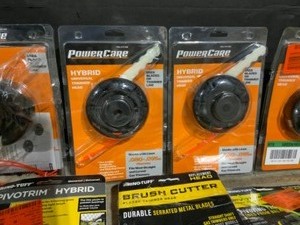 lot 14 image: Various Kinds of Rhino Turf & PowerCare Trimmer Heads, Line, & Steering Knobs. Various Conditions. See Pictures