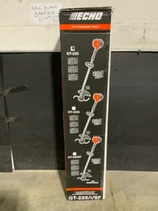lot 46 image: ECHO 21.2 cc Gas 2-Stroke Cycle Curved Shaft Trimmer. See Pictures