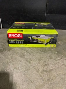 lot 48 image: RYOBI 7 in. 4.8 Amp Tabletop Tile Saw. See Pictures