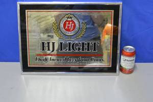 Herman Josephs Light Draft-brewed beer from Coors mirror