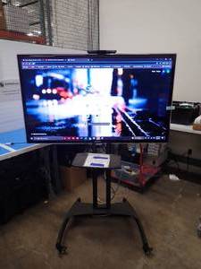 Samsung 60 UN60D6000SFXZA Mounted TV  Cart is in good condition with castor wheels and adjustable TV height, Includes power, remote, and 15ft HDMI cord