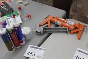lot 463 image: Caulk Tubes (x3),  Caulk Guns (x3), Caulk Tub (x1)