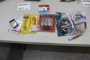 lot 461 image: Lot of (12) Plumbing Supplies  Housewares - Double Bolt Clamps, Everbilt Hinge Project Pack, Porter-Cable Staples, Universal Kitchen Faucet Set, Pex Female Thread Elbows,