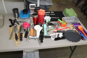 lot 477 image: Kitchenwares - Utensils, Towels, Knives, Coffee Mugs, Measuring Cups, Loaf Pans, Cooking Utensils, Cheese Grater
