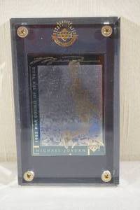 lot 70 image: Upper Deck Authenticated Michael Jordan 1985 Rookie of the Year Card - 1985