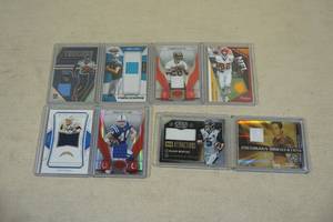 lot 104 image: Football Patch Cards - Henry, Bosa, Dunn, Clark