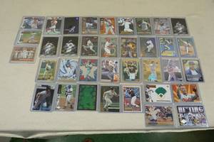 lot 144 image: Baseball Cards - Ripken Jr, Sosa, Bonds