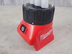 lot 12 image: Milwaukee M18 18-Volt Lithium-Ion Cordless 700-Lumen LED LanternTrouble Light w USB Charging