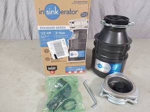 lot 28 image: New 12 HP Garbage Disposal