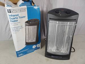 lot 97 image: Infrared Quartz Tower Heater - Works but Has Cosmetic Damage