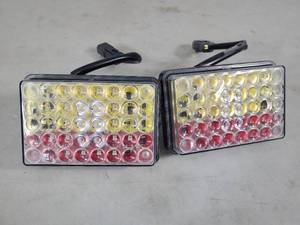lot 103 image: 2 New CAT Equipment Stop, Tail, and Turn LED Lights