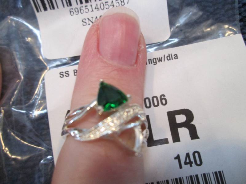 Lot of 4 Rings with missing stones,...