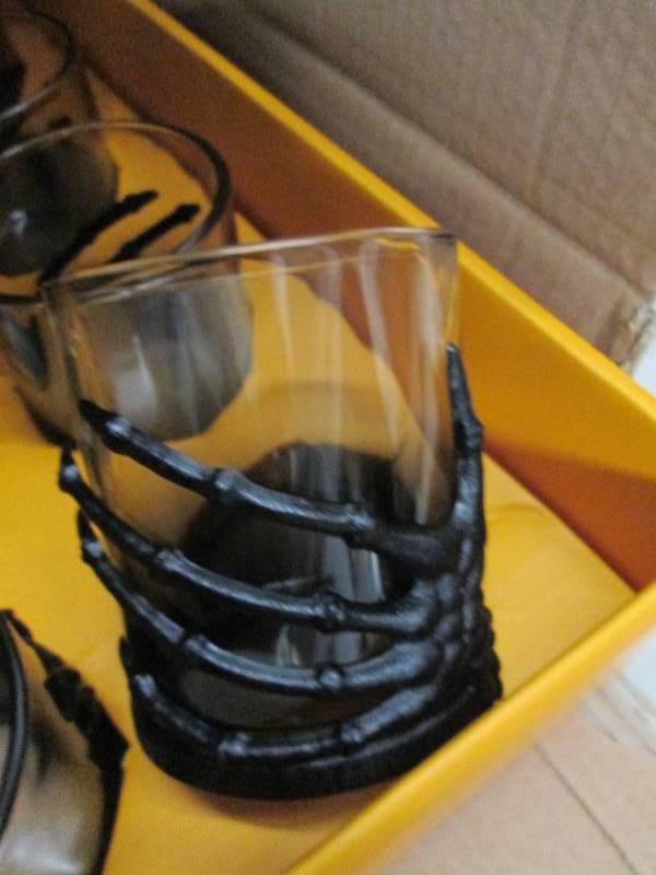 case of skull hand whiskey glasses ...