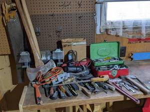 lot 26 image: Large Lot of Miscellaneous Hand Tools Saws, Axe, Wrenches, Sockets and More