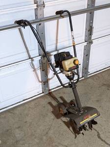 lot 33 image: Ryobi 410r Lawn Tiller