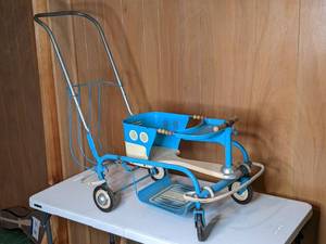 lot 18 image: Teal Vintage Murray Go Round Stroller